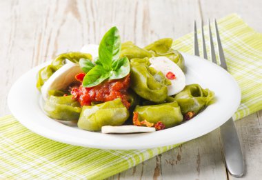 Italian healthy food - Green spinach tortellini clipart