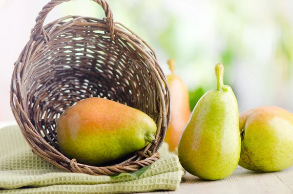 Fresh pears in the basket — Stock Photo, Image