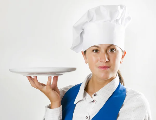 Chef showing empty plate — Stock Photo, Image