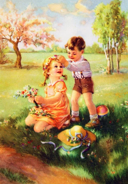 少年を調整頭女の子に花輪を捧げる — ストック写真