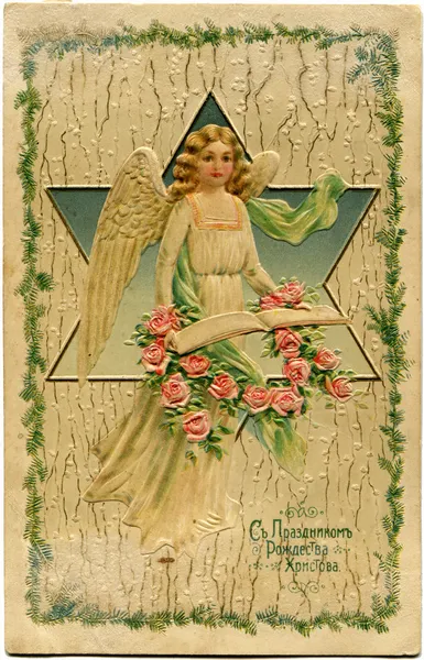 Άγγελο που κατέχουν ένα στεφάνι από τριαντάφυλλα — Φωτογραφία Αρχείου
