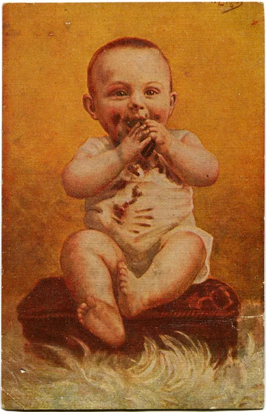 Boy eating chocolate — Stock Photo, Image