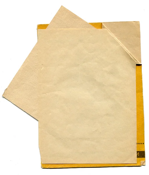 Hoplimmade ark gulnade gamla papper — Stockfoto