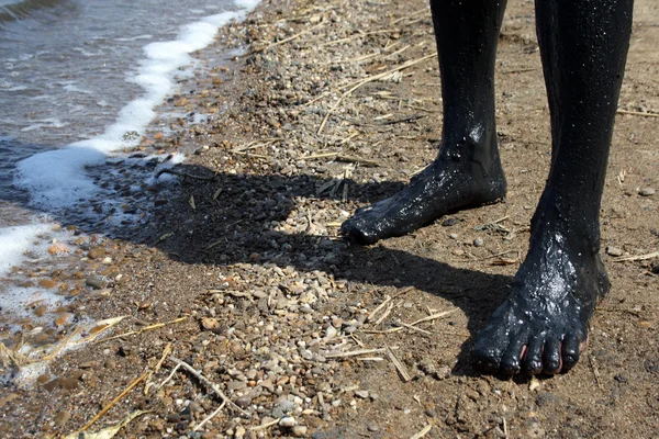 Legs covered with mud — Stock Photo, Image