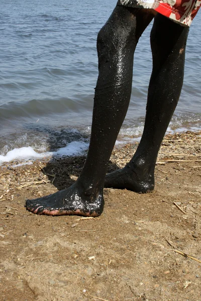 Legs covered with mud — Stock Photo, Image