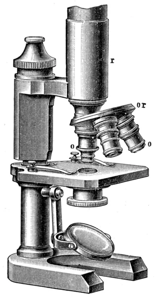 Mikroskop s třemi objektivy — Stock fotografie