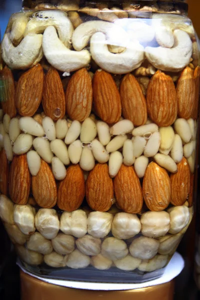 stock image Nuts which laid in jar and have been filled in by honey 2