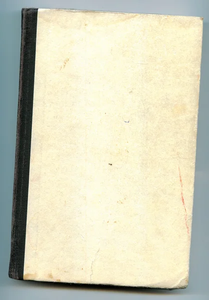 Vieux livre avec couverture blanche et colonne vertébrale noire — Photo