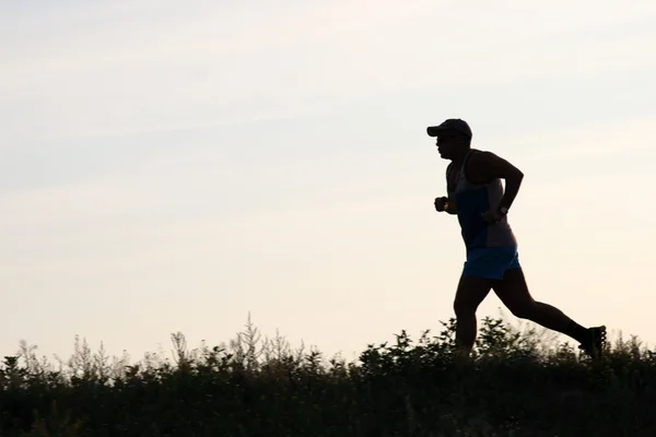 stock image Runner against sky