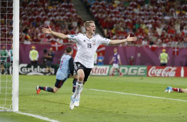 Lars Bender of Germany reacts after he scored against Denmark clipart