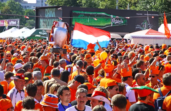 Holland football team supporters walk on a street of Kharkiv Stock Photo