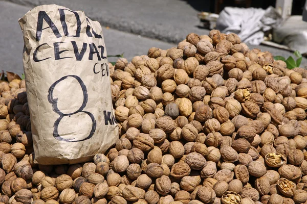 stock image Heap of walnuts on a market stall