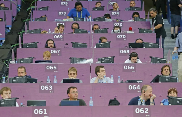 Unidentified journalists work at the Arena Lviv stadium — Stock Photo, Image