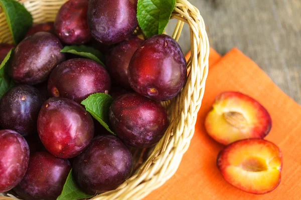 Plums on table — Stock Photo, Image