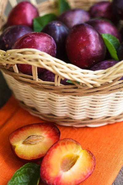 Plums on table — Stock Photo, Image