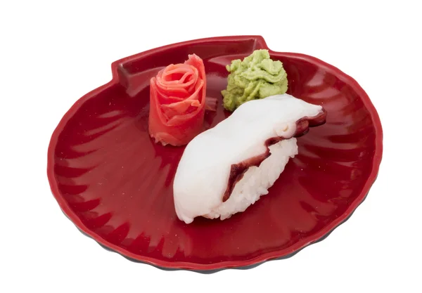 Sushi japonés con pulpo de carne sobre fondo blanco —  Fotos de Stock