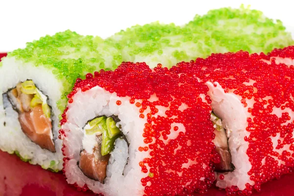 Tobiko pittig maki sushi - hete rollen met verschillende type tobiko ( — Stockfoto