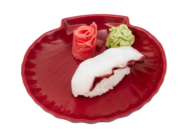 Japanisches Sushi mit Fleischkrake auf weißem Hintergrund — Stockfoto