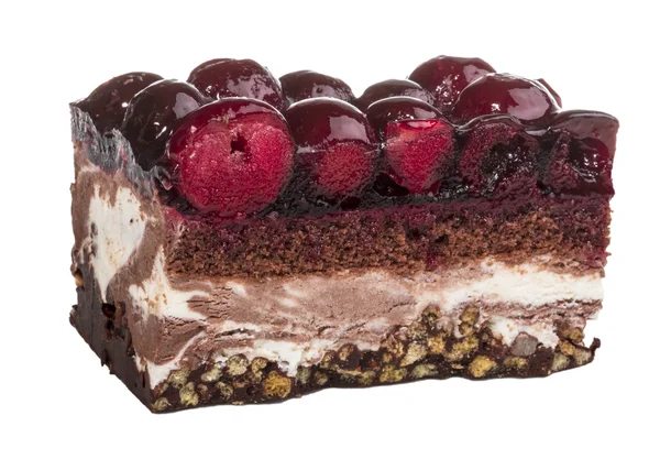 Bolo de chocolate com cereja em cima em um fundo branco — Fotografia de Stock