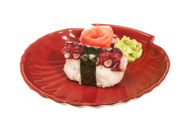 Sushi giapponese con polpo di carne su sfondo bianco — Foto Stock