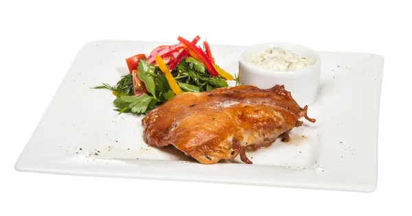 stock image Roasted chicken with vegetables on a white plate