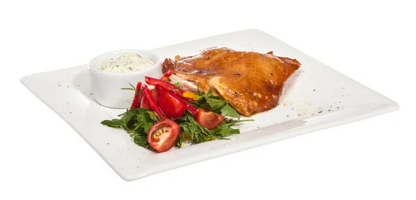 stock image Roasted chicken with vegetables on a white plate