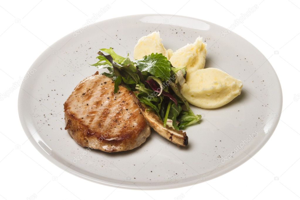 Grilled pork with salad and potato