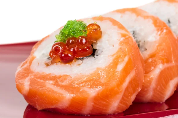 Japanese sushi traditional japanese food.Roll made of salmon, red cavair, roe and cream — Stock Photo, Image