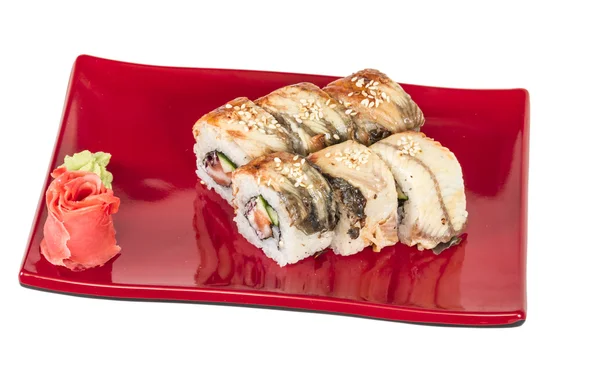 :Japanse traditionele keuken - maki roll met komkommer, roomkaas en rauwe zalm en aal — Stockfoto