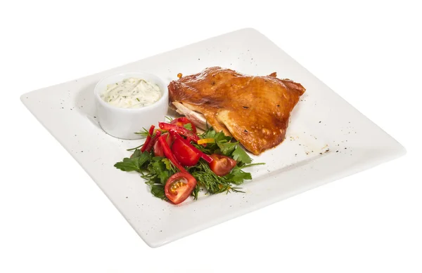 Stock image Roasted chicken with vegetables on a white plate