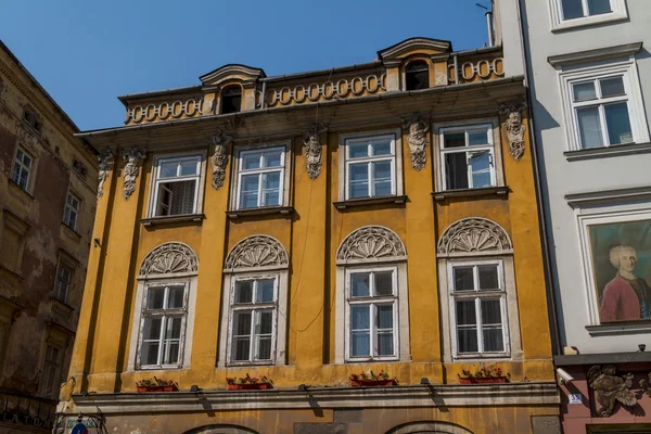 Překrásná Fasáda domu starého města v Krakově, Polsko — Stock fotografie