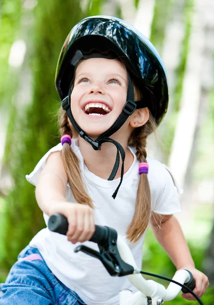 Girl on the bicycle — Stock Photo, Image