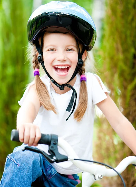 Girl on the bicycle — Stock Photo, Image