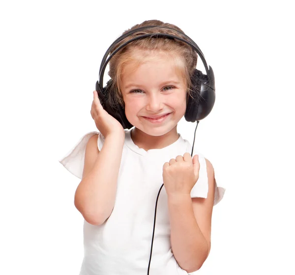 Little girl with headphones Royalty Free Stock Photos