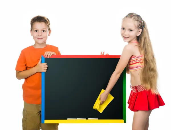 Kids with a board — Stock Photo, Image