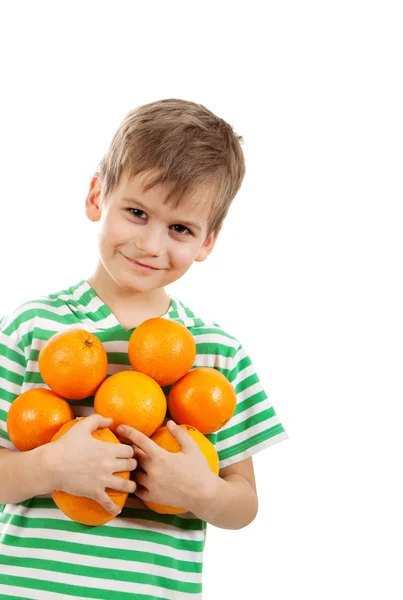 Ragazzo che tiene le arance — Foto Stock