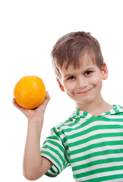 Jongen bedrijf sinaasappelen — Stockfoto