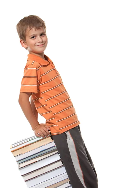 Хлопчик і книги — стокове фото