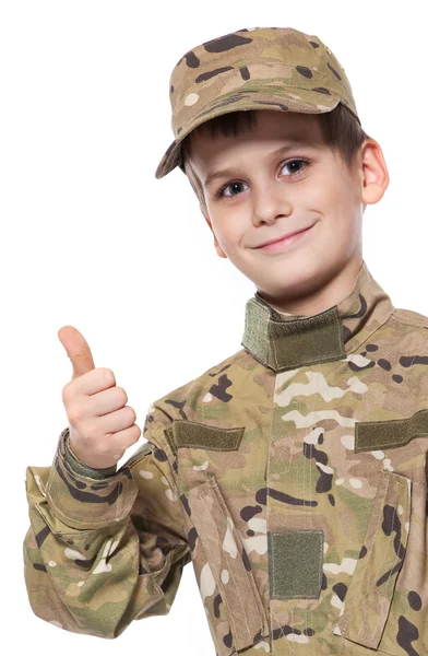 Voják zdravit. mladý chlapec — Stock fotografie