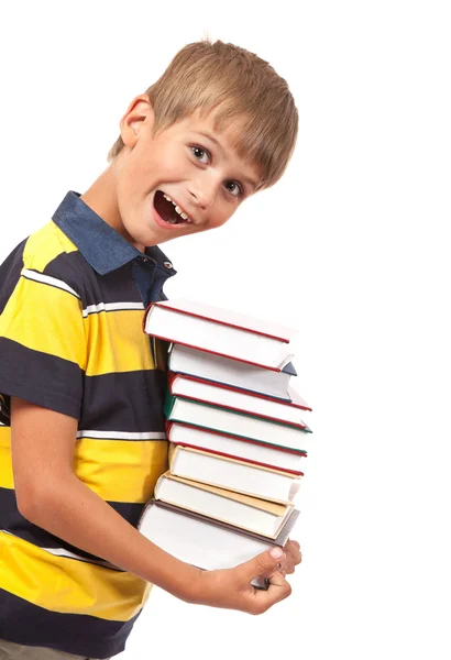 Skola pojke håller böcker — Stockfoto