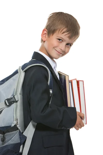 Boy holding books Stock Image