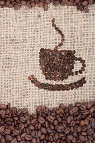 Коричневі смажені кавові зерна . — стокове фото