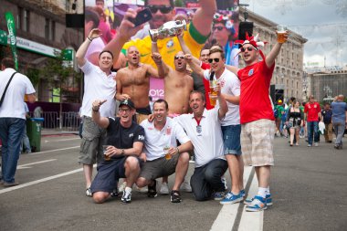 KYIV, UKRAINE - JUNE 15: England fans arrive in the fanzone befo clipart