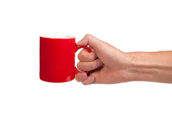 Mão masculina está segurando um copo vermelho — Fotografia de Stock