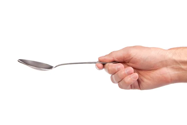 La mano sostiene una cuchara aislada —  Fotos de Stock