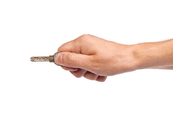 Mężczyzna ręka trzyma klucz do domu — Zdjęcie stockowe