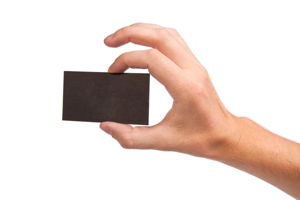 Деловой человек держит в руках чистую визитку — стоковое фото