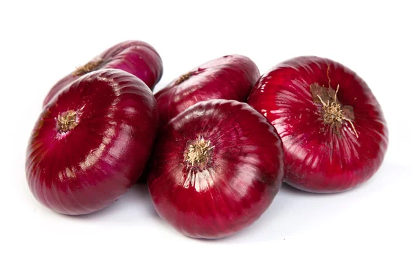 Group of a red onions, isolated on white — Stock Photo, Image