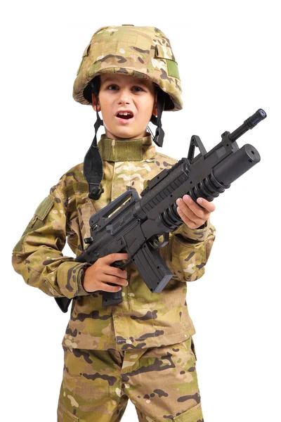 Niño vestido como un soldado con rifle —  Fotos de Stock