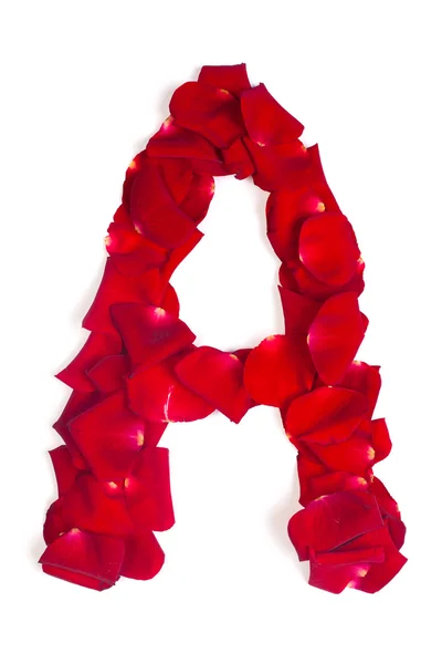Dopis vyrobený z červené lístky růže na bílém pozadí — Stock fotografie